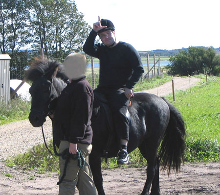 HAH! The horse didn't collapse, and the helmet made me look sooooo cool.