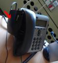 A 5 year old Motorola trying to mate with the stationary phone?