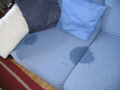 Note the two wet areas on our sofa. Picture taken straight after my ignorant attempt to clean with soap, water and a sponge